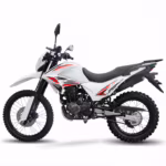 White and red dual sport motorcycle side view