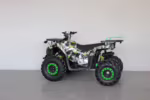 Green and black ATV with off-road tires