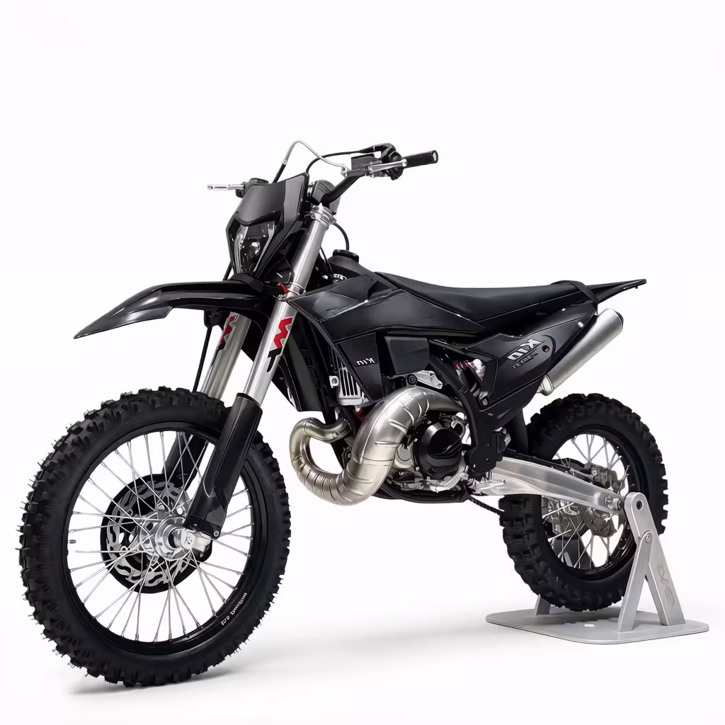 Black MX dirt bike with silver exhaust on white background