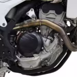 Motorcycle engine with exhaust pipe and clutch cover