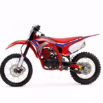 Red dirt bike with blue and white graphics side view