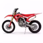Red and white dirt bike motorcycle side view