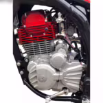 Red and silver motorcycle engine close-up view