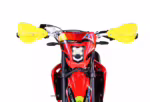 Red dirt bike front view with yellow handguards
