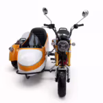 Orange and white motorcycle with sidecar front view