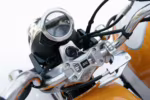 Motorcycle handlebar with speedometer and ignition switch