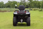 Rear view of YOKI ATV quad bike on grass field