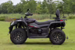 Black Yoki 4x4 ATV with large off-road tires
