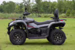 YOKI 450L 4x4 ATV parked on grass field