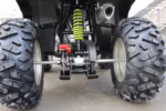 ATV rear suspension with shock absorber and axle
