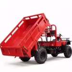 Red hydraulic dump truck with raised cargo bed