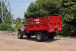 Red four-wheel cargo ATV with trailer bed