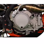 Close-up of dirt bike engine and exhaust system