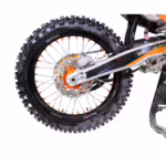 Dirt bike rear wheel with Kenda tire and disc brake