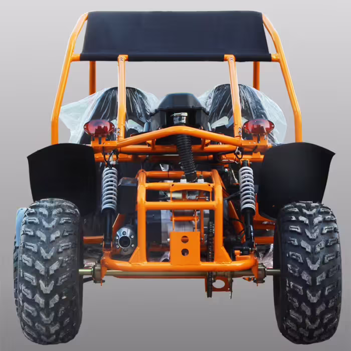 Vista trasera de un kart naranja con suspensión.