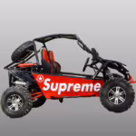 Red off-road dune buggy with Supreme branding