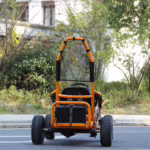 Orange go-kart rear view showing battery and roll cage