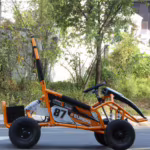 Orange and black Eureka go-kart with number 87