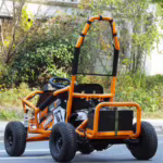 Orange off-road go-kart with roll cage and large tires