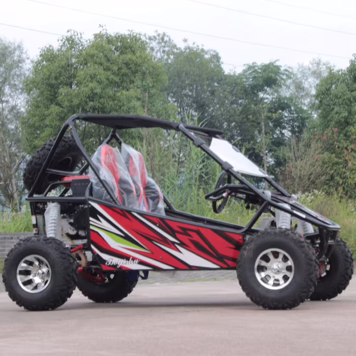 Buggy todoterreno rojo y negro con jaula antivuelco