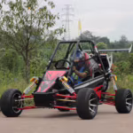 Off-road dune buggy with driver wearing helmet
