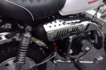 Honda motorcycle engine and chrome exhaust detail