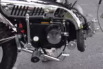 YKF Monkey motorcycle engine close-up view