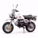 White Honda Monkey mini motorcycle side view