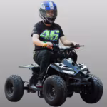 Man riding black electric ATV quad bike