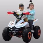 Two children riding a white kids electric quad bike ATV