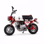 Red and white mini motorcycle side view
