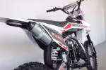 Mega dirt bike rear view with exhaust and suspension