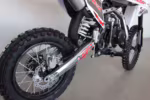 Dirt bike rear wheel with disc brake and suspension
