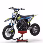 Mini dirt bike on red stand with blue and yellow graphics
