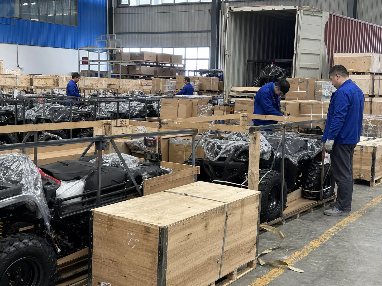 YKF MOTO export packing area preparing ATV crates and container loading