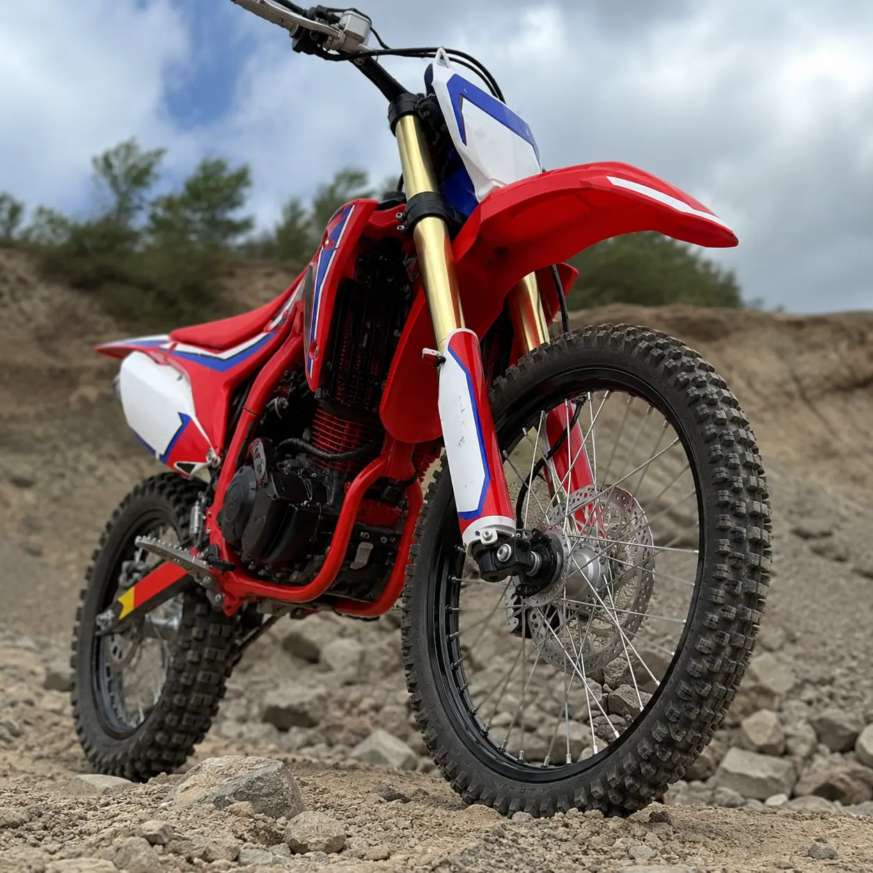 YKF-1 front wheel and inverted suspension fork on off-road terrain